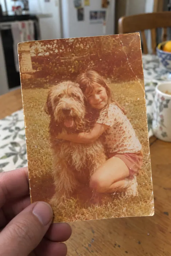 A phone photo of an old print, in your hand